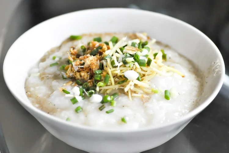 Bowl of porridge served as a soft food option recommended for healing after tooth extraction.