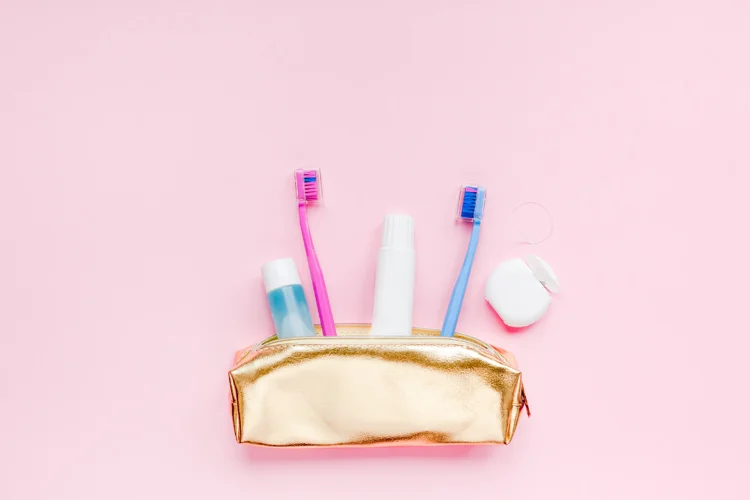 Bring a travel-sized toothbrush, toothpaste, and floss for easy cleaning after meals when you are on the go.