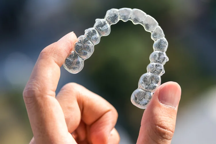 Invisalign clear and customised aligners gently and gradually shift teeth, providing benefits such as a discreet appearance, removability, comfort, and customised treatment.