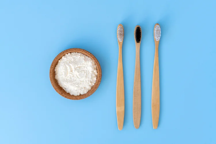 Sodium bicarbonate (baking soda) acts as a mild abrasive and alkaline agent to gently polish enamel without affecting tooth structure while helping maintain a balanced pH in the mouth.